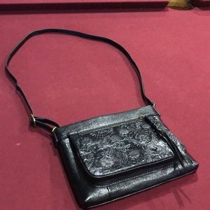 Sak black leather handbag